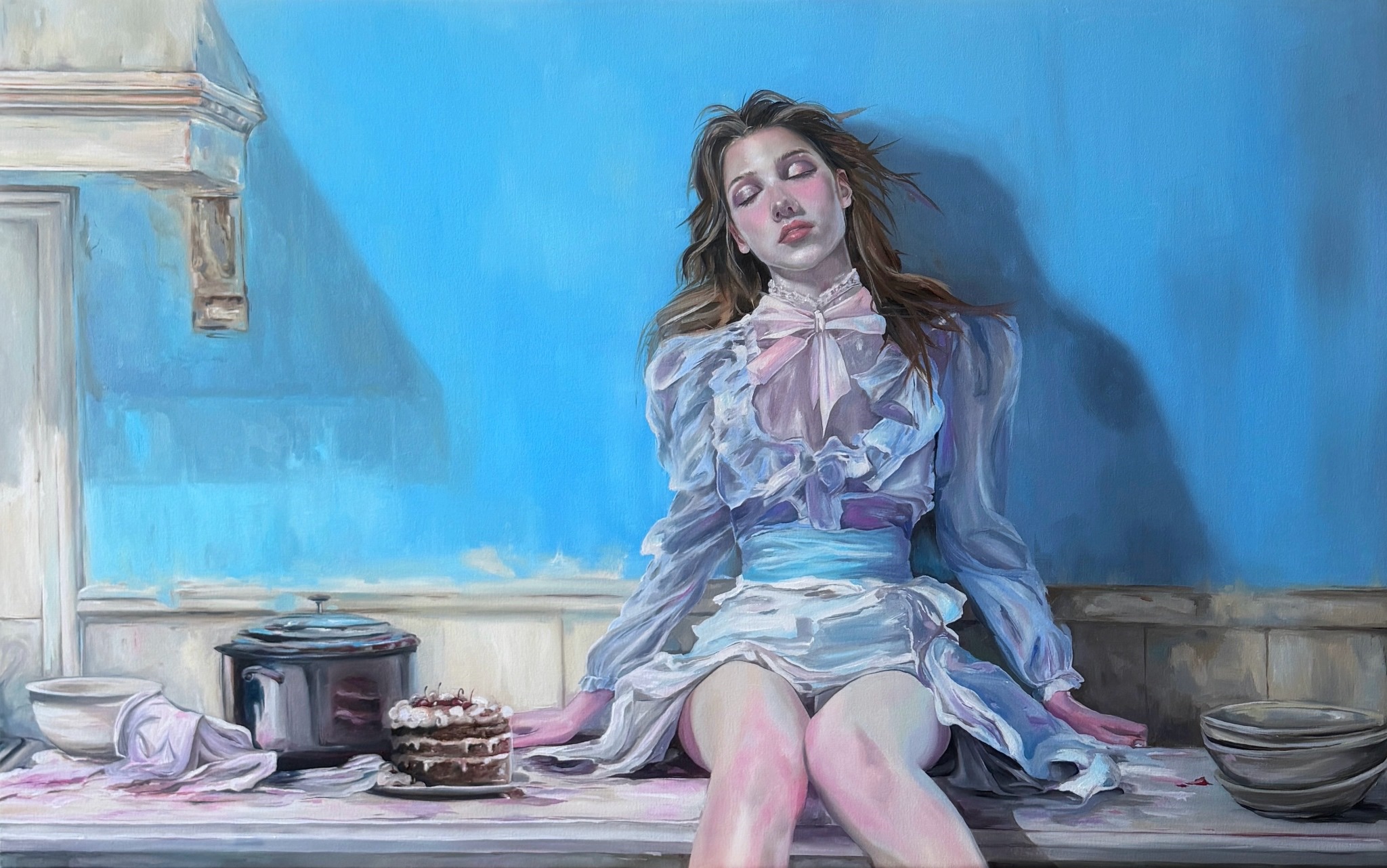 A seated figure in a pale dress resting at a kitchen counter